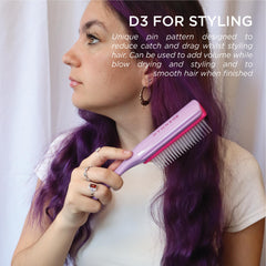 Denman D3 held in hand to show scale and control for styling