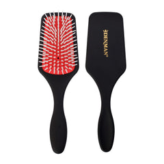 Denman D38 front view showing brush shape and black finish for easy styling