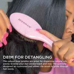 Denman detail of nylon pins easing tangles and reducing hair breakage
