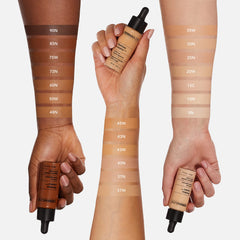 Dermablend bottle with label visible highlighting SPF 50+