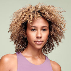 DevaCurl close-up of curl texture after application showing enhanced clumping and healthy shine
