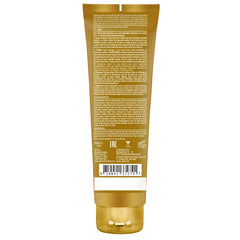 Devoted Creations lotion texture on hand demonstrating rich, blendable formula
