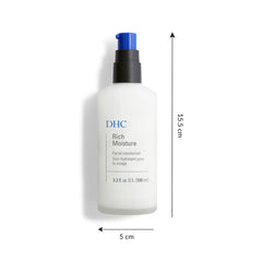 DHC moisturizer on fingertip demonstrating application and lightweight feel