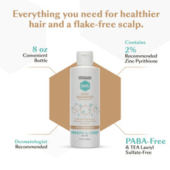 DHS zinc shampoo bottle held in hand illustrating 8 oz scale and travel-friendly convenience