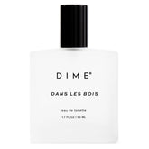 DIME perfume bottle front view showing elegant design and wearable luxury