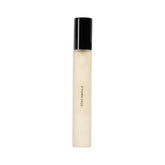DIME Stay Awhile front view showing compact travel bottle and label benefit: portable luxury