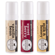 Dionis three-pack front packaging showing jumbo lip balms and benefits