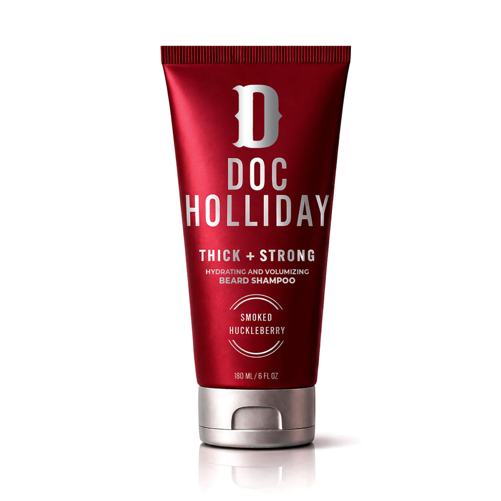 DOC HOLLIDAY front packaging showing smoked huckleberry bottle and branding for confident grooming