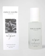 Dolce Glow facial mist sprayed on model, provides instant dewy hydration