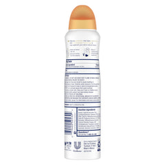 Dove spray nozzle close-up demonstrating quick dry application benefit
