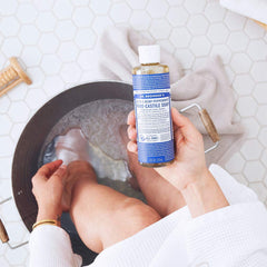 Dr. Bronner's Lavender soap texture pouring for moisturizing gentle-lather benefit