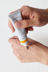 Dr. Hauschka applied on cheek showing natural, even tint