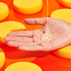 Drunk Elephant jelly cleanser texture close-up showing smooth gel and gentle makeup-melting action