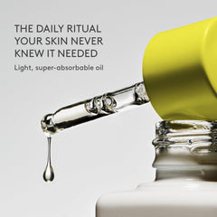 Drunk Elephant oil texture on skin highlighting lightweight absorption and glow