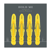Drybar Hold Me front view showing four clips and neat packaging, professional grip benefit