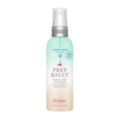 Drybar bottle front view showing Coconut Colada scent and portable size benefit