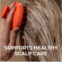 ds labs brush held in hand showing ergonomic palm-fit and non-slip grip