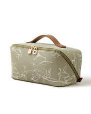 EACHY front view of green floral cosmetic bag showing compact design and style