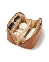 EACHY front view showing compact brown PU leather bag and organized look