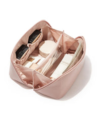 EACHY front view of pink medium cosmetic bag showing shape and color, travel-ready