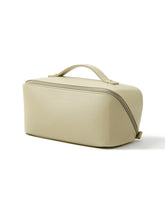 EACHY green bag front view showing compact travel-friendly design and easy access