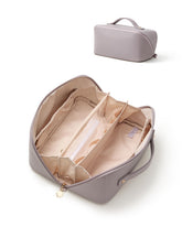 EACHY front view purple travel makeup bag showing neat profile and zipper benefit
