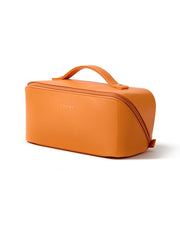 EACHY front view of orange makeup bag showing zip and clean finish, easy packing