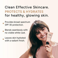 Eight Saints 2 oz tube shown in hand to convey true size