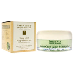 Eminence moisturizer spread on hand demonstrating absorption and glow