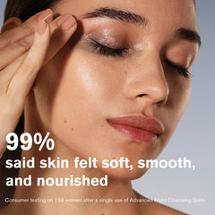 Estée Lauder balm warming on fingers demonstrating melt-to-oil action for gentle makeup removal