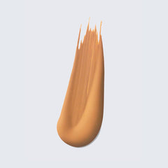 Estée Lauder pump and label detail highlighting shade name and lasting benefits