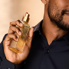 Estée Lauder ingredients close-up highlighting citrus and wood notes benefits