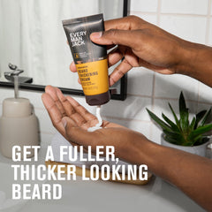 Every Man Jack applying cream to beard for added body and easier styling