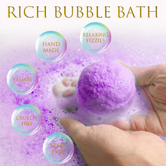 Excalla bath bomb fizzing in tub producing bubbles and scent for calming soak