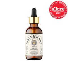 Fable & Mane dropper dispensing HoliRoots oil for precise application