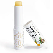 Farmacy lip balm front tube showing branding and compact design for easy hydration