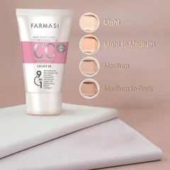 Applying Farmasi CC Cream with fingers for quick natural coverage