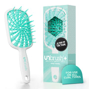 FHI Heat UNbrush Plus front view showing lightweight design and bristle layout for gentle detangling