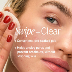 First Aid Beauty jar opened revealing stacked pre-soaked acne pads
