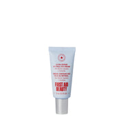 First Aid Beauty jar front view showing compact travel friendly packaging and gentle formulation benefit