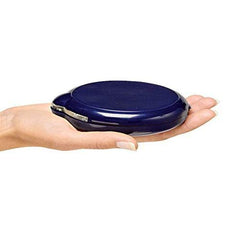 Floxite folded compact inside a purse demonstrating portable convenience
