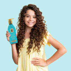 Freeze It in-use on long hair demonstrating frizz control and shine