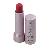 Fresh Sugar rose front packaging showing compact tinted lip balm and SPF protection