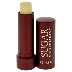 Fresh sugar lip treatment texture close-up displaying buttery shine and smooth spread