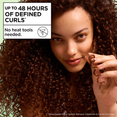 Garnier Fructis conditioner creamy texture demonstrating hydration boost