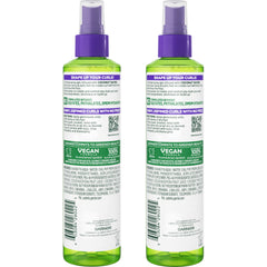 Garnier Fructis spray in hand demonstrating easy application and even coverage