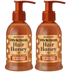 Garnier bottle front view showing honey repairing serum benefits