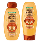 Garnier Whole Blends front packaging displaying both 22 fl oz bottles and benefits