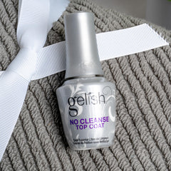 Cured nails with Gelish top coat showing chip-resistant, salon-ready shine