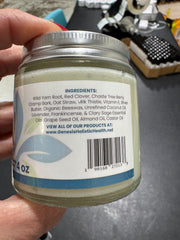 Genesis Holistic Health cream texture close-up showing smooth, fast-absorbing finish